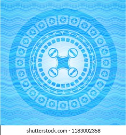 air drone icon inside light blue water emblem background.