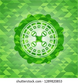 air drone icon inside realistic green mosaic emblem