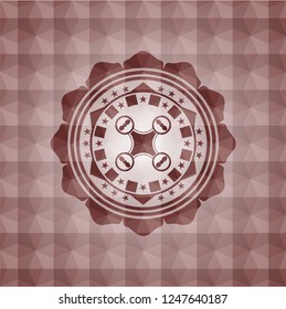 air drone icon inside red seamless emblem with geometric pattern background.