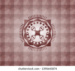 air drone icon inside red emblem or badge with abstract geometric polygonal pattern background. Seamless.