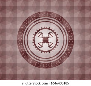 icono del dron de aire dentro del emblema geométrico rojo sin fisuras.
