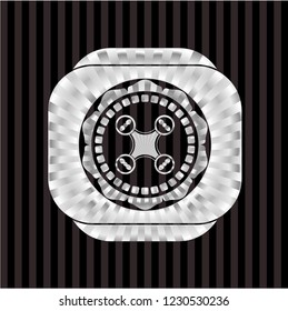 air drone icon inside silvery badge
