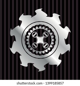 air drone icon inside silvery shiny badge
