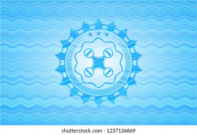 air drone icon inside water wavec oncept emblem.