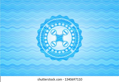 air drone icon inside water wave representation style badge.