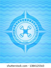 air drone icon inside water wave style badge.