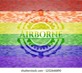 Airborne on mosaic background with the colors of the LGBT flag