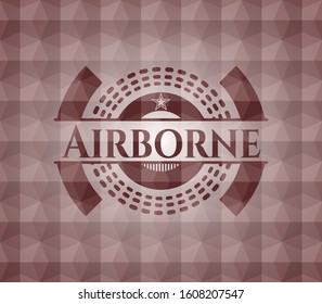 Airborne red emblem with geometric pattern. Seamless.