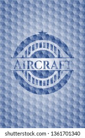 Aircraft blue badge with geometric pattern.