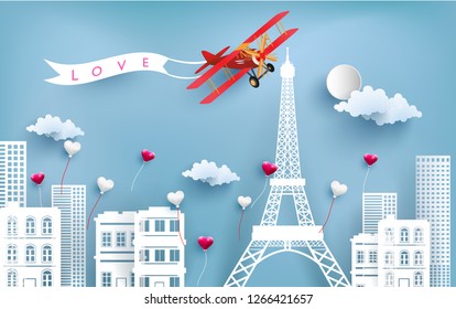 aircraft carrying love banners flying over the city and eiffel towers. paper art design. happy valentine's day