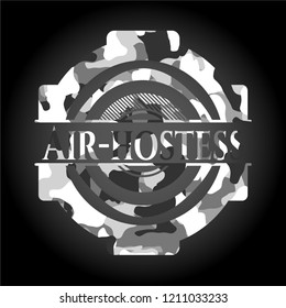 Air-hostess on grey camo texture