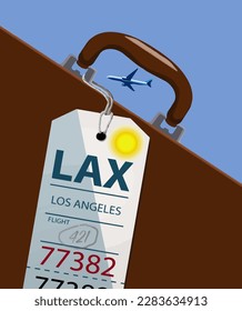 An airline luggage tag hangs from a suitcase or briefcase as an airliner flies high above in the background. This travel tag is for LAX which is Los Angles.