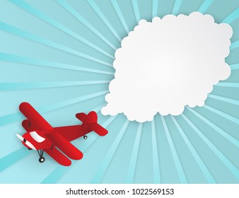 Airplane aerial view paper art with paper cloud ( speech bubble ) for text. Flying origami paper art red plane. Blue sky background with rays