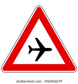 Airplane and attention sign on white