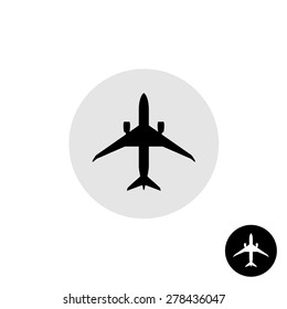 Airplane black vector icon. Single silhouette of a passenger plane top view.