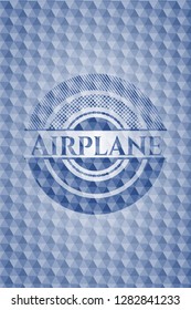 Airplane blue emblem or badge with geometric pattern background.