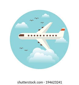 Airplane flying in the blue sky.