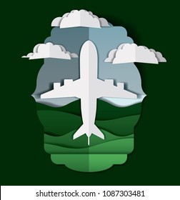 airplane flying with clouds and landscape