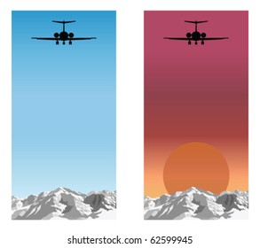 Airplane flying over mountain range blue sky and sunrise