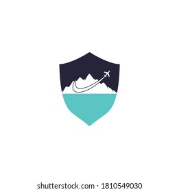 Airplane and Mountain shield shape concept Vector logo design. Travel logo design. plane with mountain logo.