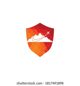 Airplane and Mountain shield shape concept Vector logo design. Travel logo design. plane with mountain logo.