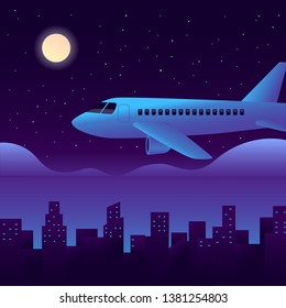 airplane at night time fly over the light city