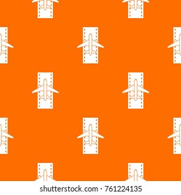Airplane on the runway pattern repeat seamless in orange color for any design. Vector geometric illustration