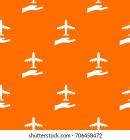 Airplane and palm pattern repeat seamless in orange color for any design. Vector geometric illustration