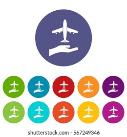 Airplane and palm set icons in different colors isolated on white background