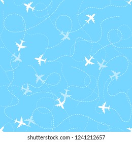 Airplane routes with dotted line, seamless pattern on blue background