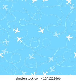 Airplane routes with dotted line, seamless pattern on blue background
