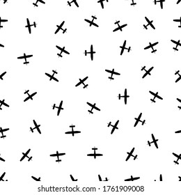 Airplane seamless pattern. Background of planes for travel. Texture of aircrafts for boys. Wallpaper with aviation in air. Military map for flight. Silhouette for airline and tourism. Vector.