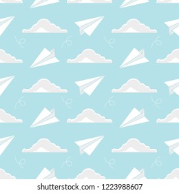 Airplane Seamless Pattern or Background. Repeating Pattern for Wallpaper Fabric or Wrapping Paper. Clouds with Paper Airplanes Flying In Between.