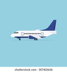 Airplane staying on the ground, isolated on blue background