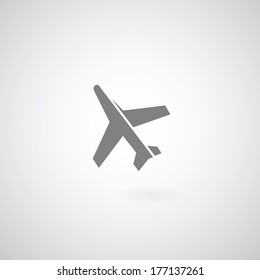 airplane symbol on gray background 