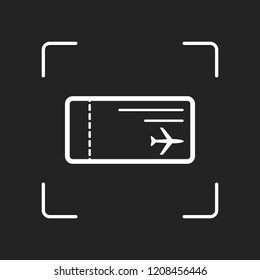 airplane ticket icon. White object in camera autofocus on dark background