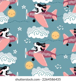Pilotos de aviones y perros.Patrón transparente para niños con nubes y soles.Colores rosa, amarillo y azul.Mascota negra y blanca.Imprimir en tela y papel.Dibujo vectorial con dibujos a mano de dibujos animados.