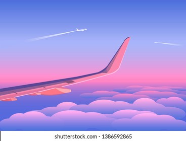 Airplanes over the clouds in the sky at the sunset