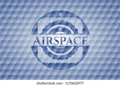 Airspace blue emblem or badge with abstract geometric pattern background.