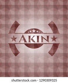 Akin red emblem or badge with geometric pattern background. Seamless.