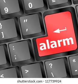 alarm button on a black computer keyboard