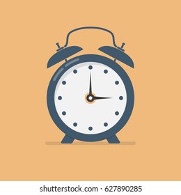 Alarm clock in a flat design. Vector illustration
