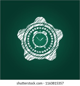 alarm clock icon drawn on a chalkboard