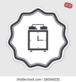 Alarm clock icon. Flat design style. Made vector illustration. Emblem or label with shadow.