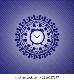 alarm clock icon inside badge with jean texture