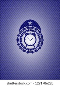 alarm clock icon inside badge with jean texture