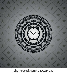 alarm clock icon inside black emblem