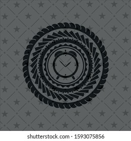 alarm clock icon inside black emblem