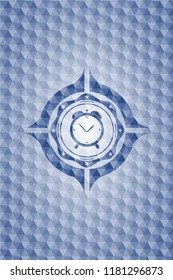 alarm clock icon inside blue emblem or badge with abstract geometric pattern background.
