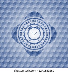 alarm clock icon inside blue emblem with geometric pattern background.